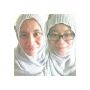 me and kakak testingtesting our shawls . first eva try . teehee !